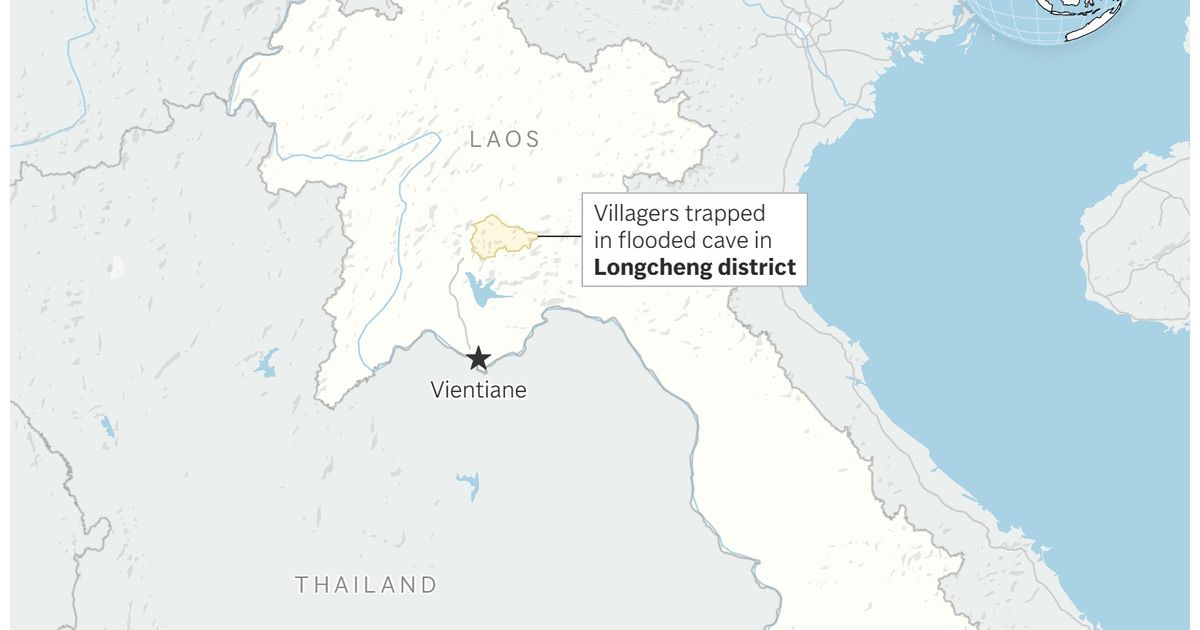 Rescuers search for alternative route to reach 2 missing in a flooded Laos cave