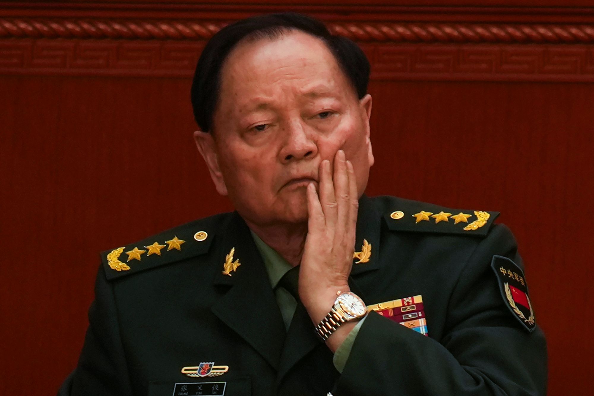China expels 2 top military leaders accused of corruption from the ruling Communist Party