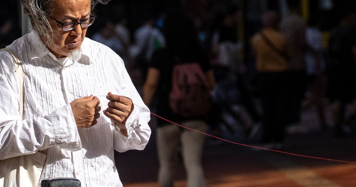 A Hong Kong artist trying to mark the Tiananmen crackdown is quickly stopped by police