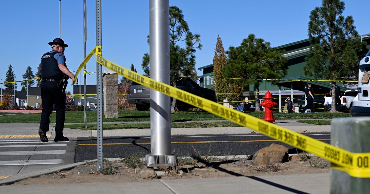 The Latest: Teacher threw cellphone and tackled gunman who killed 4 at Oregon school, police say