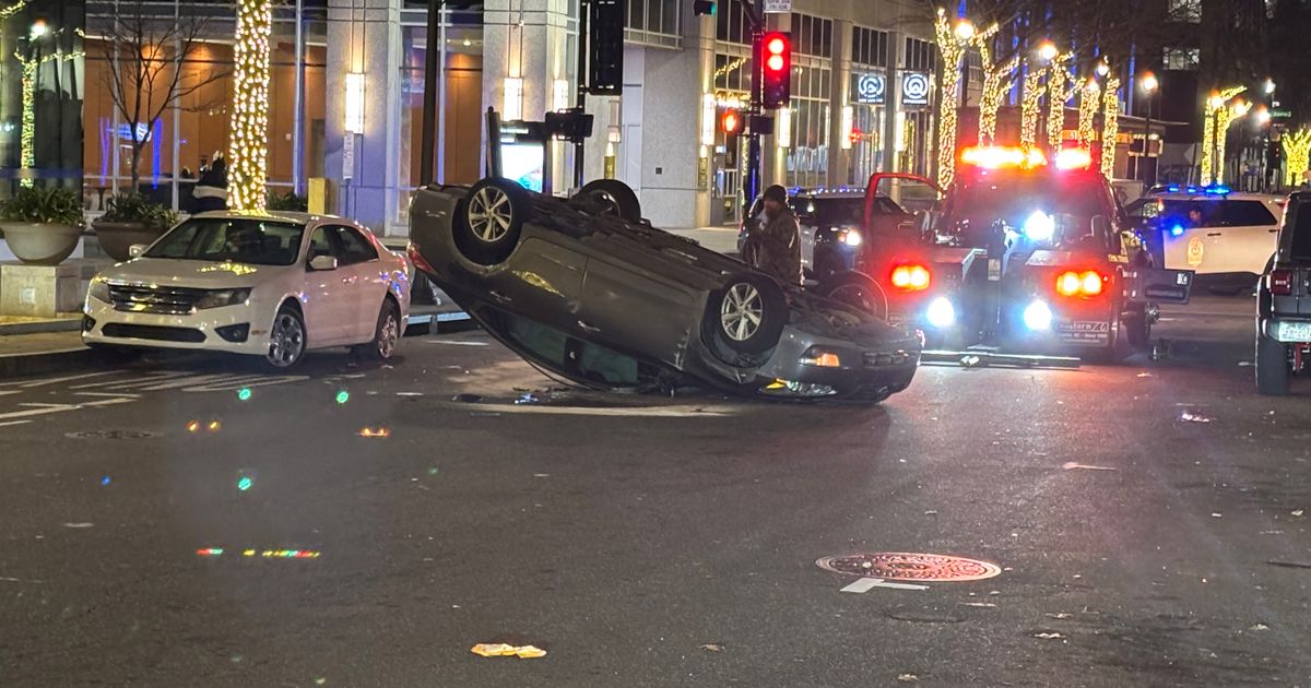 Car overturns, causes road closure in downtown Raleigh