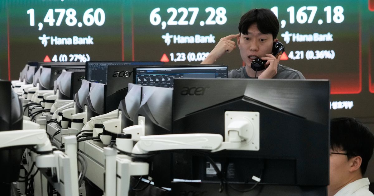 Asian stocks lower and oil falls after Wall Street sets another record on ceasefire hopes