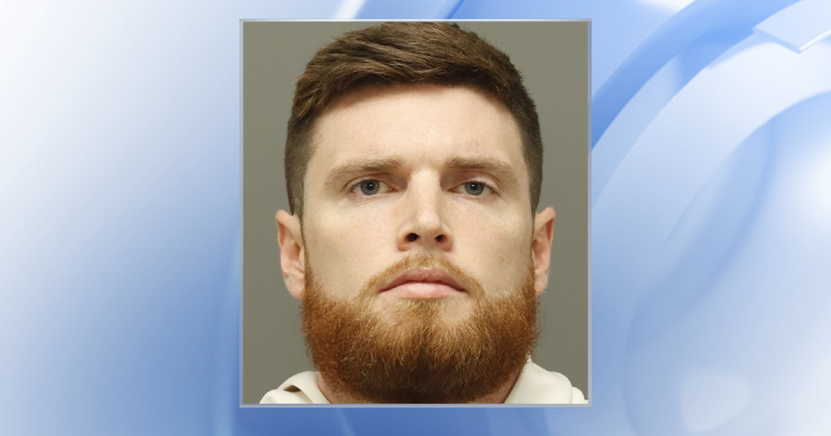 Clayton High School basketball coach charged with assaulting woman