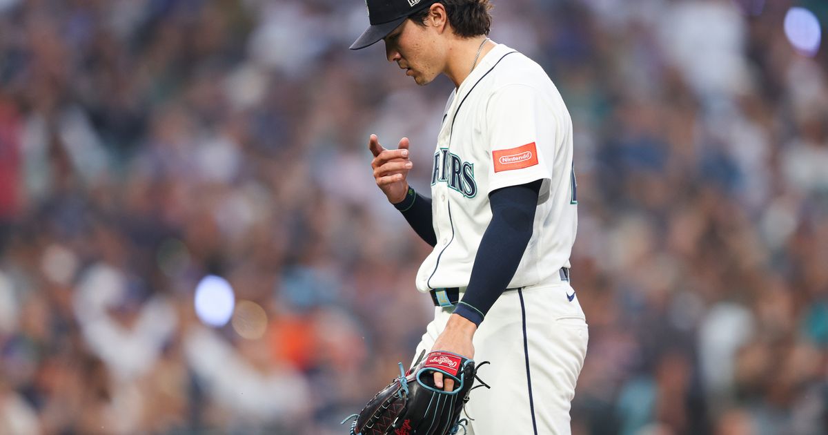 Seattle Mariners pitcher Bryan Woo (22) reacts after the seventh inning of a baseball game against the Detroit Tigers