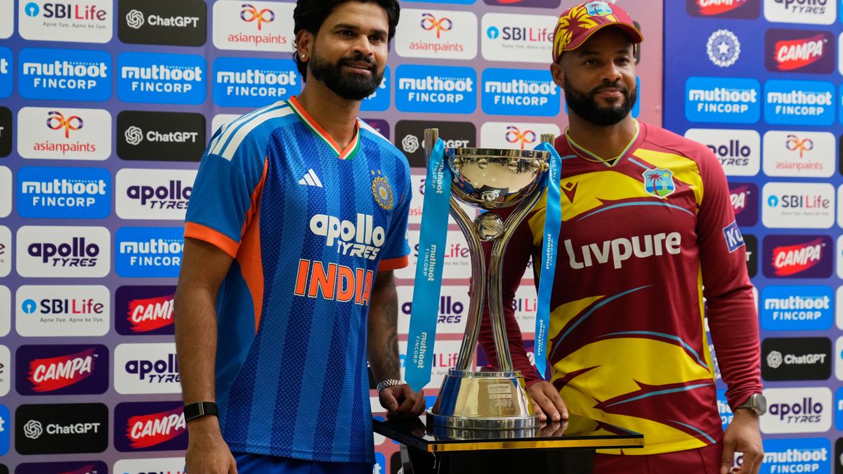cricket India's captain Shreyas Iyer and West Indies' captain Shai Hope, right, pose with the winners' trophy after the five-match T20 cricket series between the two countries concluded in a draw, in Bengaluru, India, Saturday, Oct. 17, 2026. (AP Photo/Aijaz Rahi)
