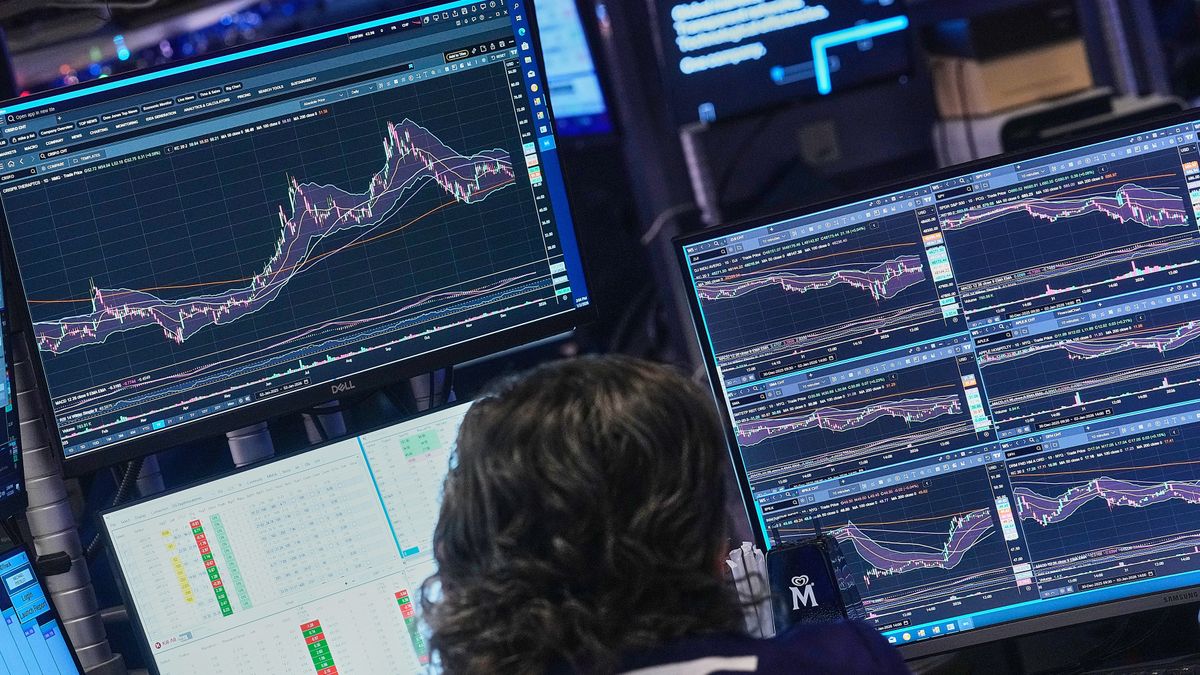 Specialist Michael Pistillo works at his post on the floor of the New York Stock Exchange, Friday, Jan. 2, 2026. (AP Photo/Richard Drew)