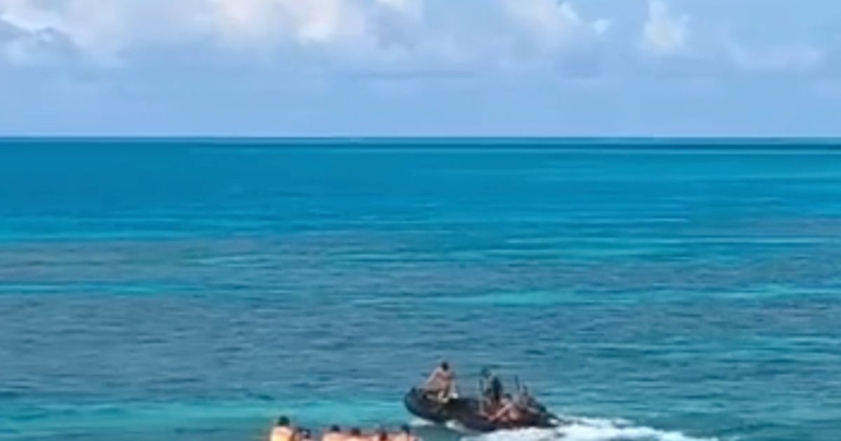 Philippines accuses Chinese coast guard of injuring Filipino sailor in disputed shoal