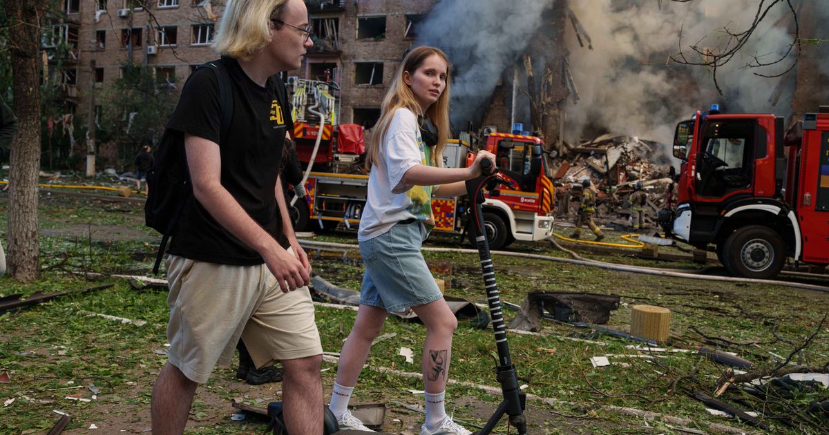 In one of Kyiv's most frequently bombed neighborhoods, residents choose to stay