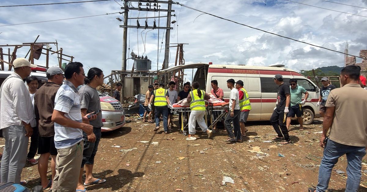 Rescuers dig for bodies after a massive mining explosives blast in Myanmar kills at least 43