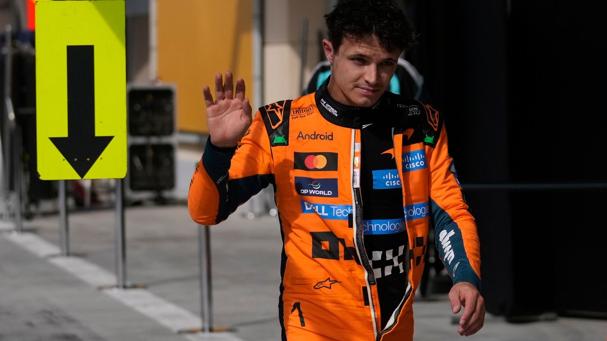 McLaren driver Lando Norris of Britain walks back to his garage during a Formula One pre-season test at the Bahrain International Circuit in Sakhir, Bahrain, Thursday, Feb. 12, 2026. (AP Photo/Altaf Qadri)