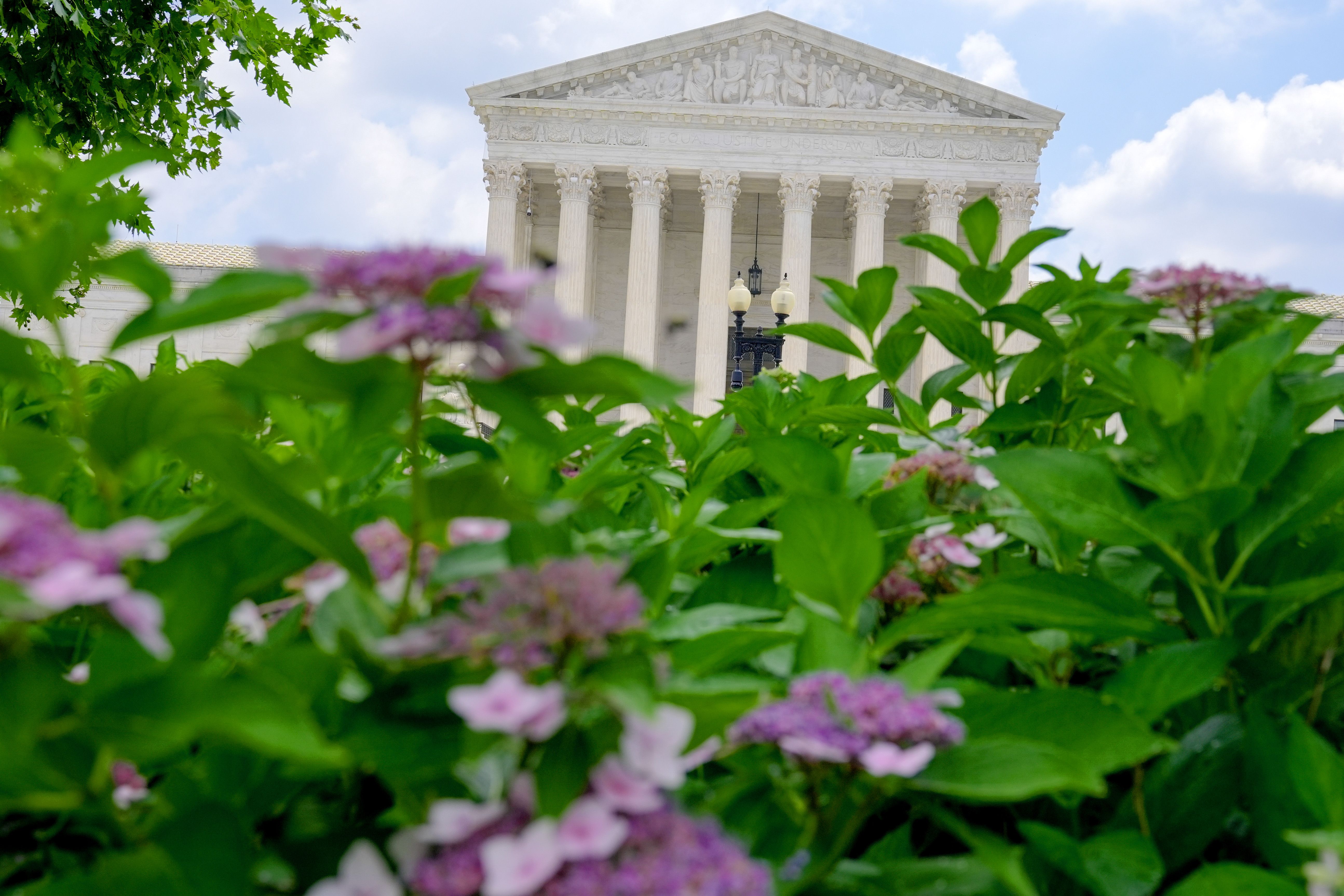 The Latest: Supreme Court upholds birthright citizenship, trans athlete bans