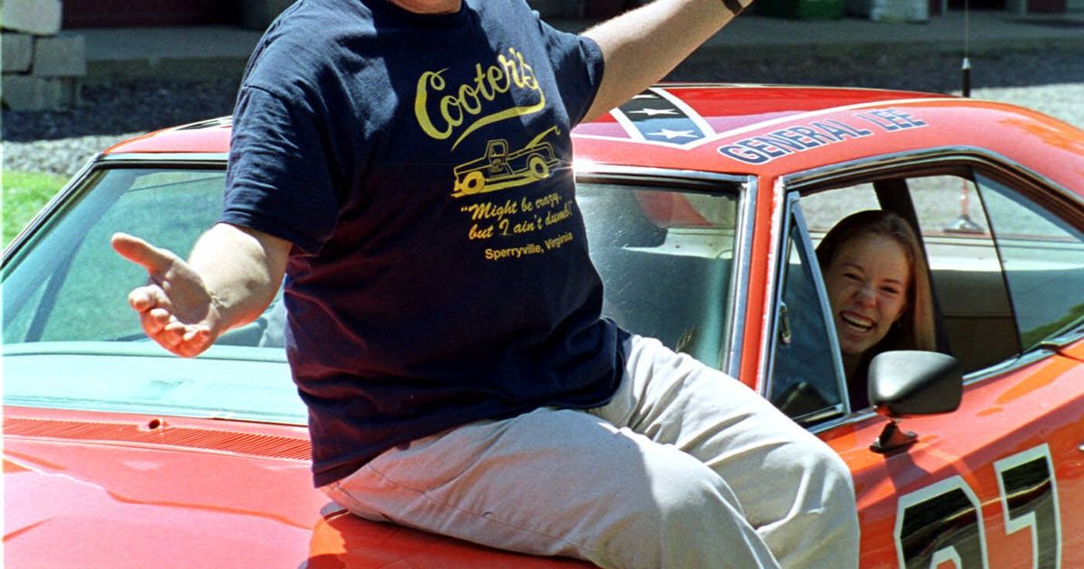 FILE - Cooter, actor Ben Jones, sits atop one of the 229 hotrods, named the General Lee, used in the show "Dukes of Hazzard"