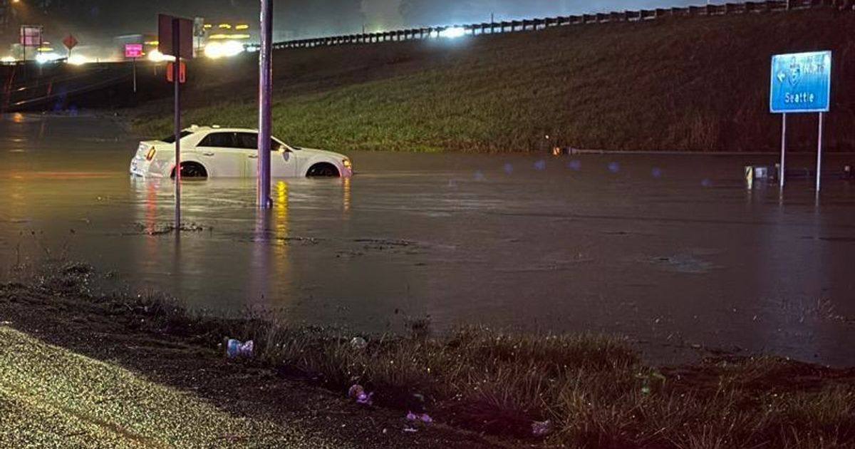 Storms bring heavy rain to the Pacific Northwest, snow and freezing rain to the Upper Midwest