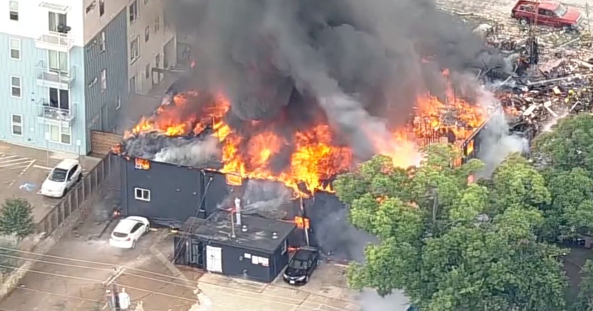 A large fire has erupted at an apartment complex in Dallas
