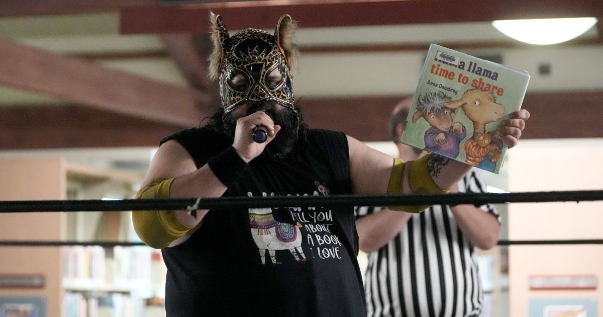 Wrestling matches provide an action-packed story time at US libraries, in photos