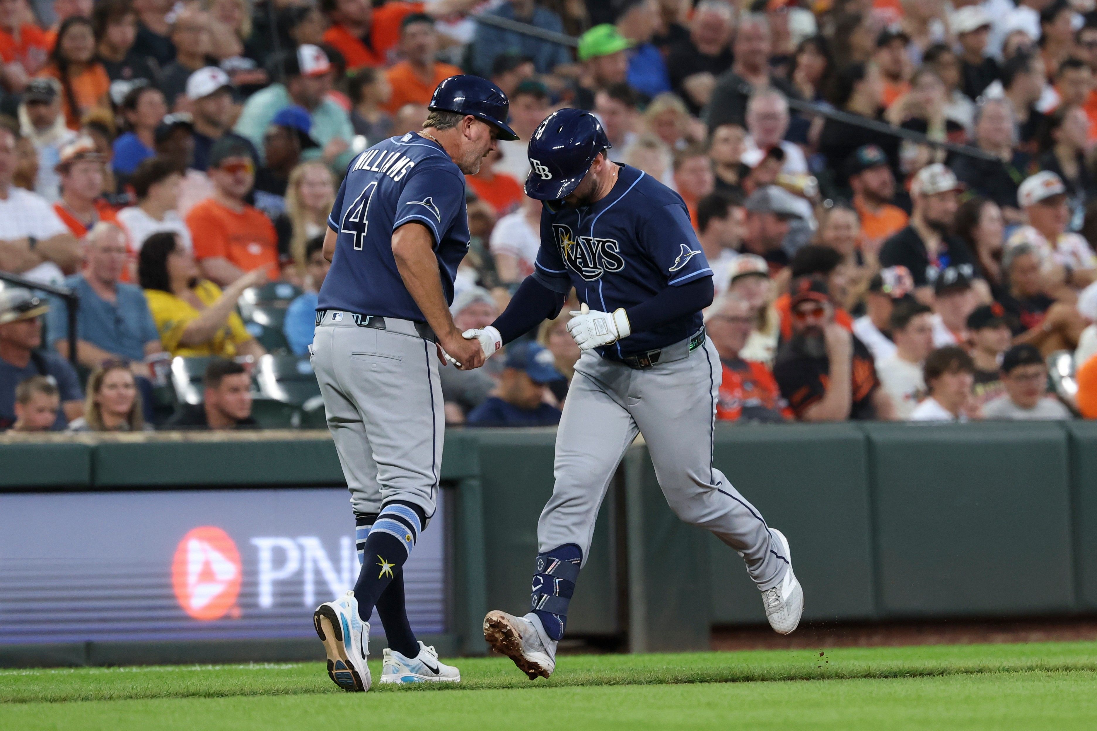 Beavers leads off 10th with pinch double to lift the Orioles past the Rays , 3 - 2