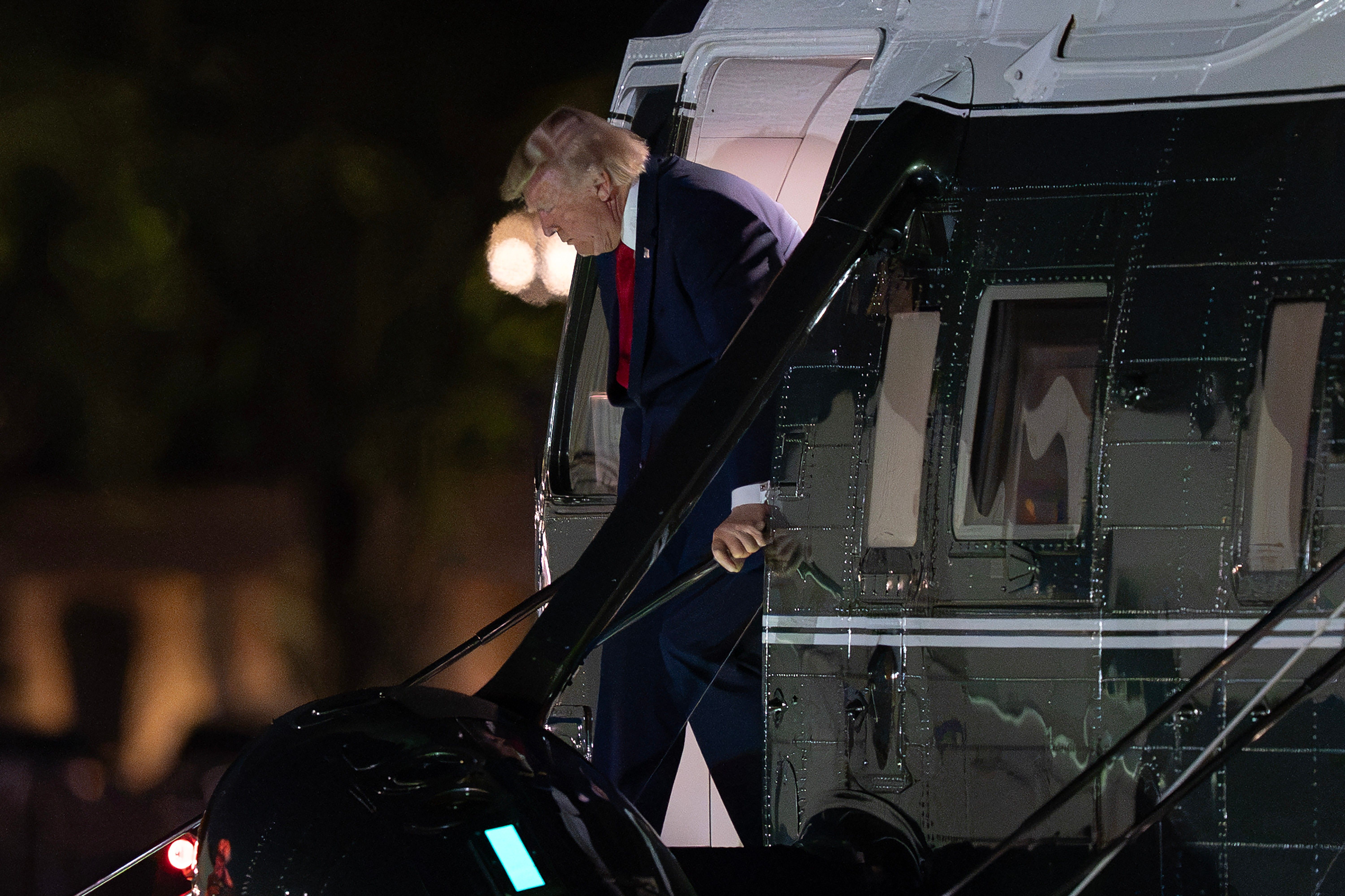 The Latest : Senate committee votes to hold Fauci in contempt over refusal to answer questions