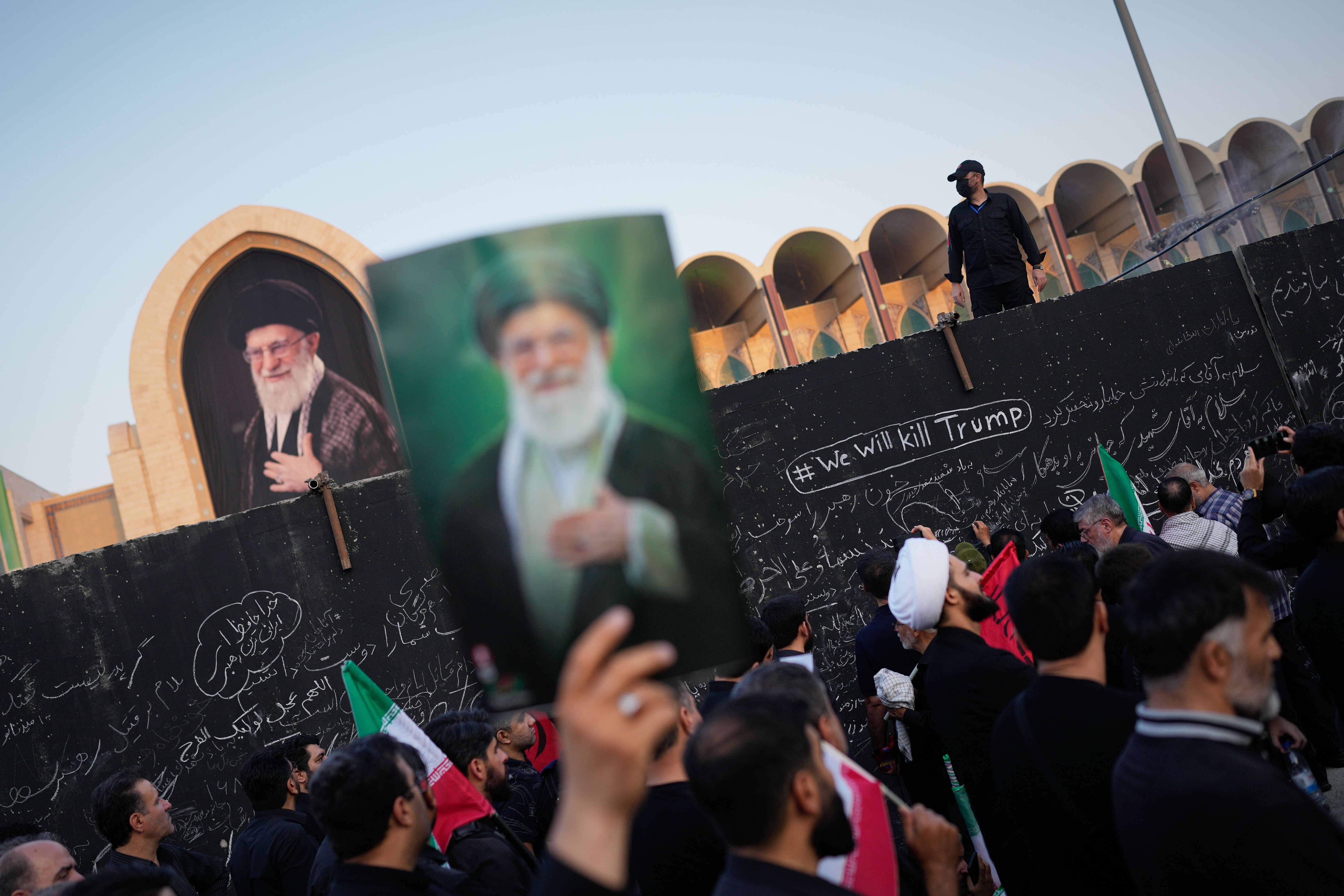 A bitterly divided Iran grapples with Khamenei's legacy as he is laid to rest