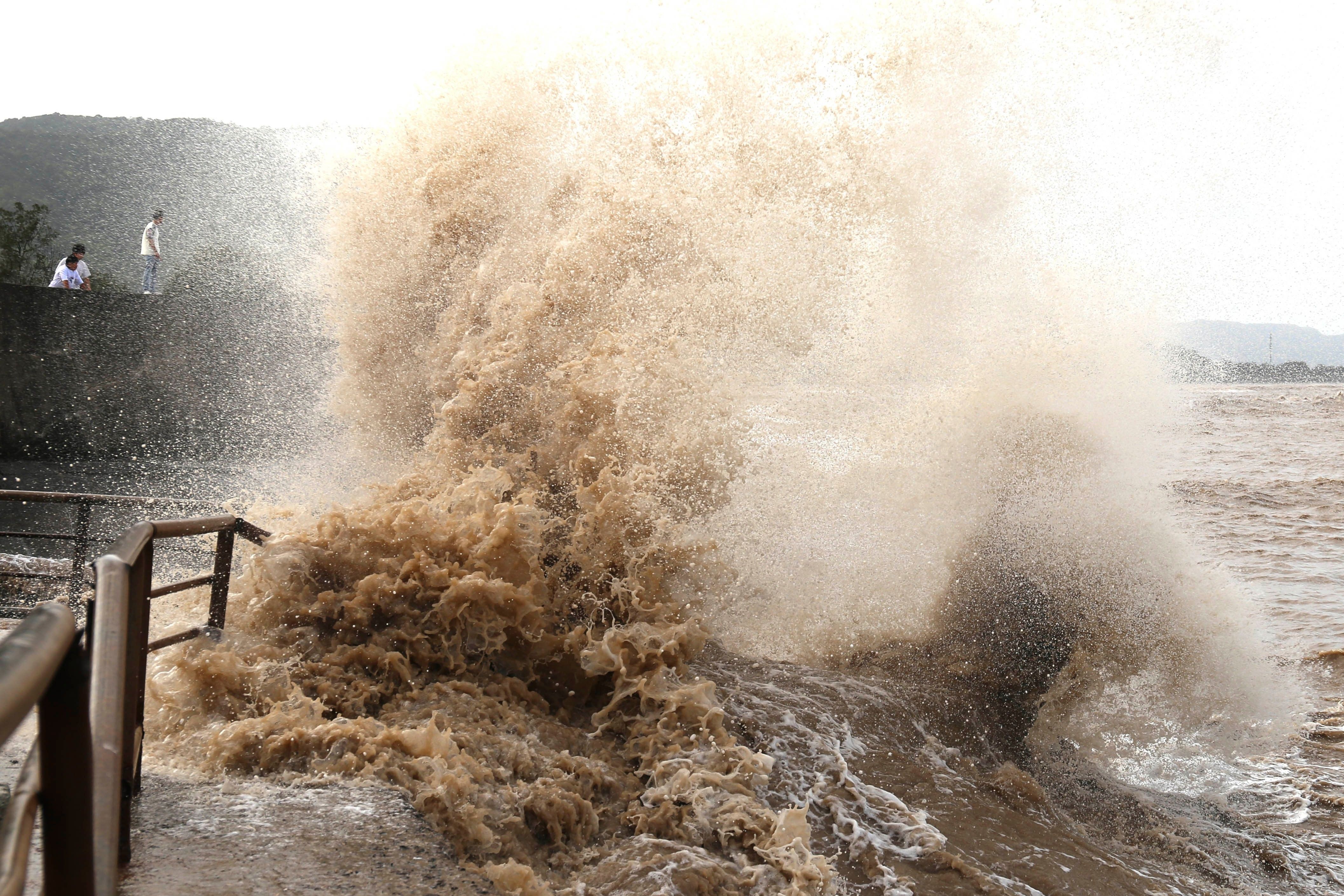 Typhoon Bavi brings strong winds and rain to eastern China as more than 2 million people evacuated
