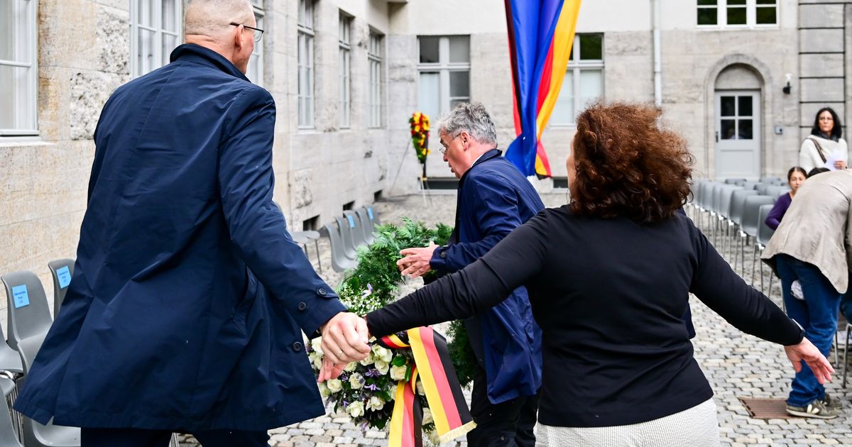 Descendant of Nazi opponent tries to remove far-right party's wreath at Hitler plot memorial event