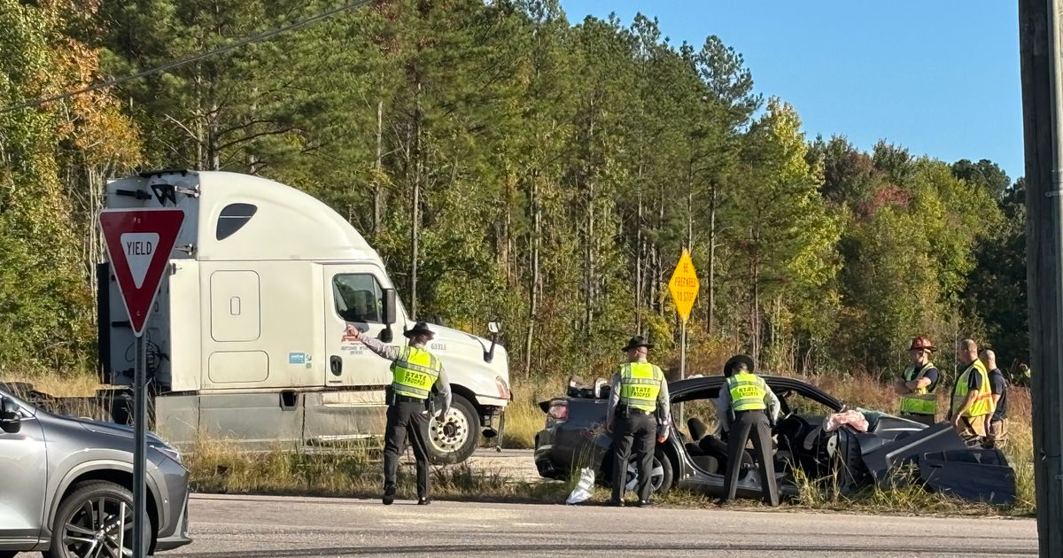 Tractor-trailer crash closes part of US-70W Business