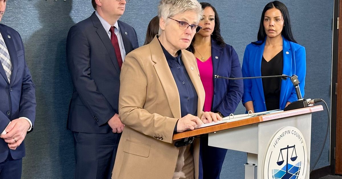 County prosecutor charges ICE agent with assault for pointing gun at people on Minneapolis highway