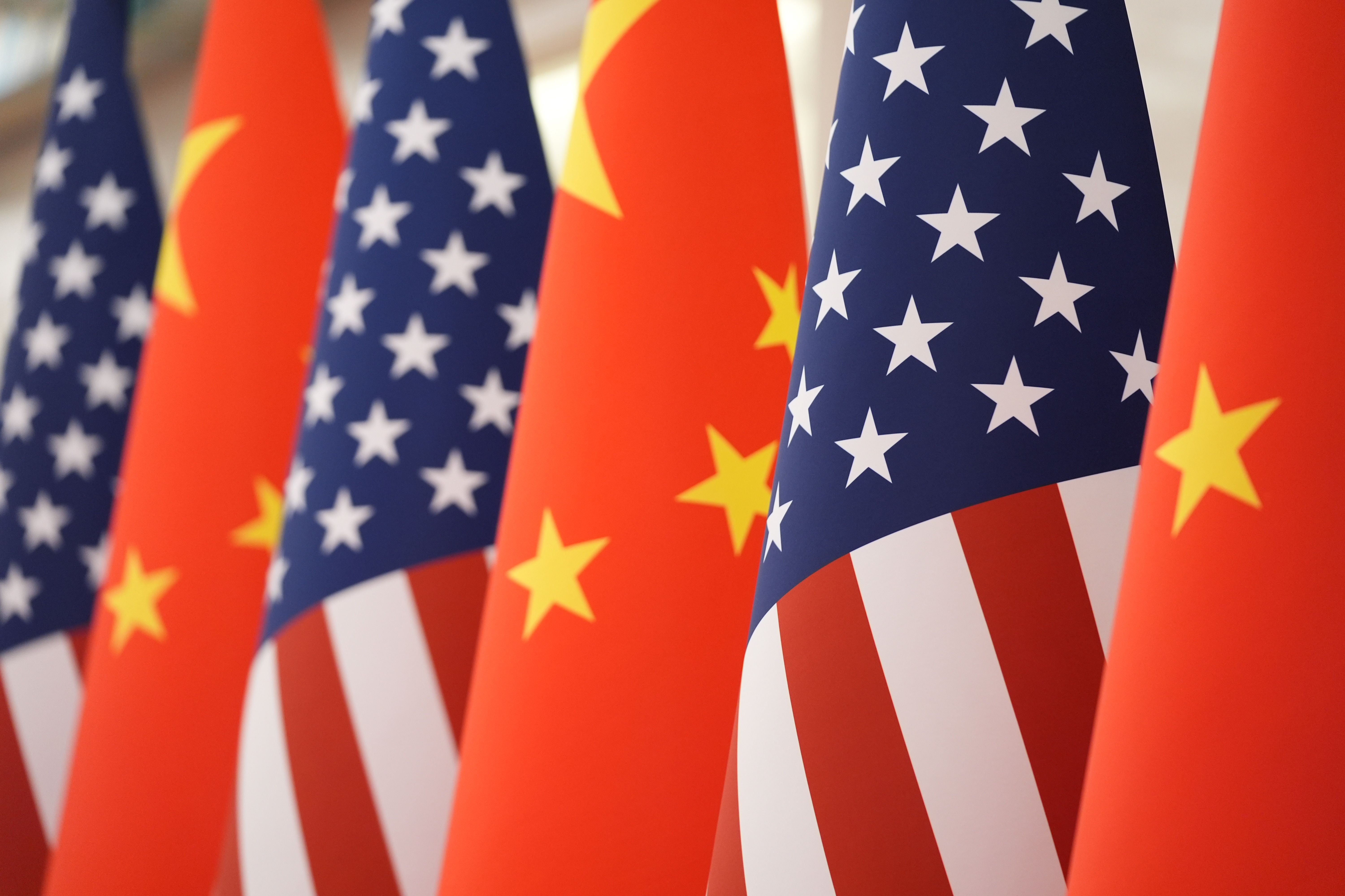 China hits back at US sanctions on tech giants , restricting its exports to American defense firms