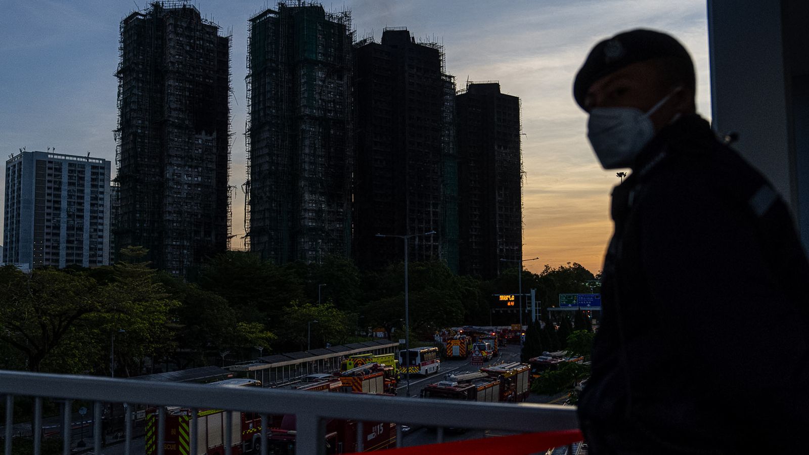 Hong Kong firefighters make final search for survivors after apartment  tower blaze kills 128 :: WRAL.com
