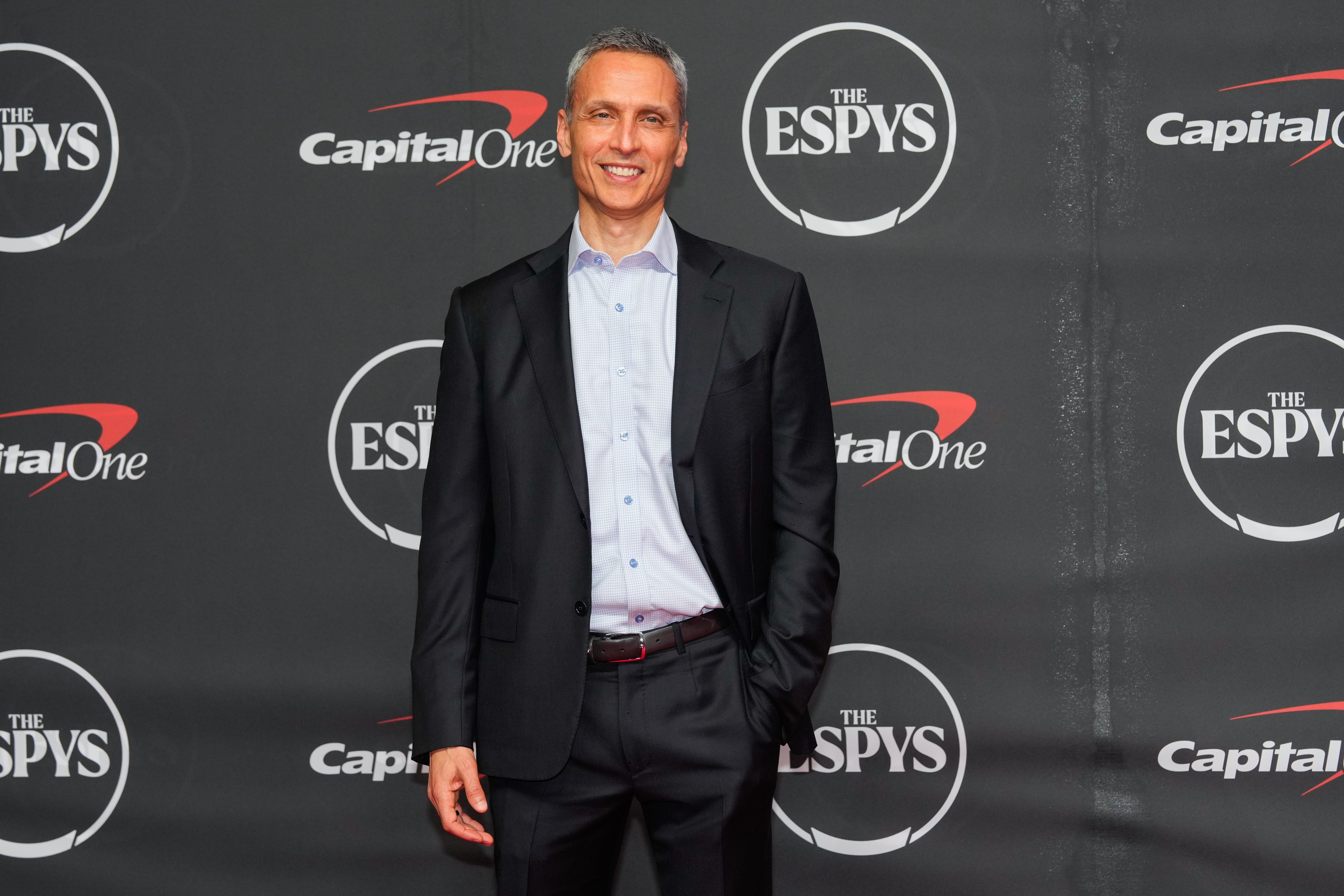 ESPN starts layoffs tied to NFL Network acquisition , memo says