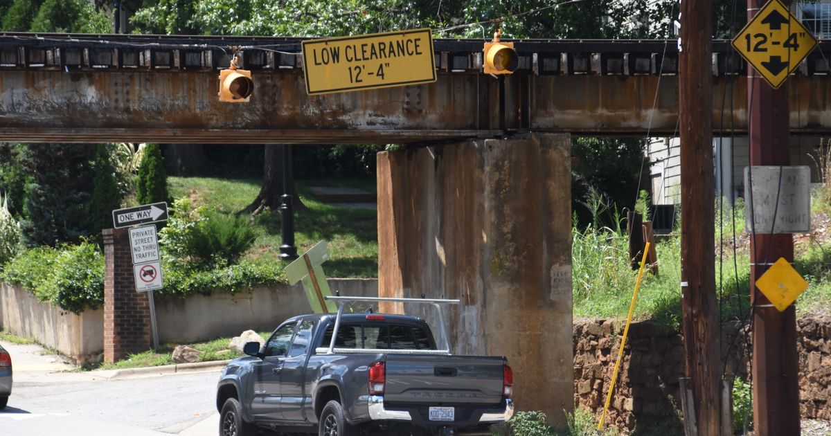 Conflicting height measurements raise questions after Peace Street bridge crashes