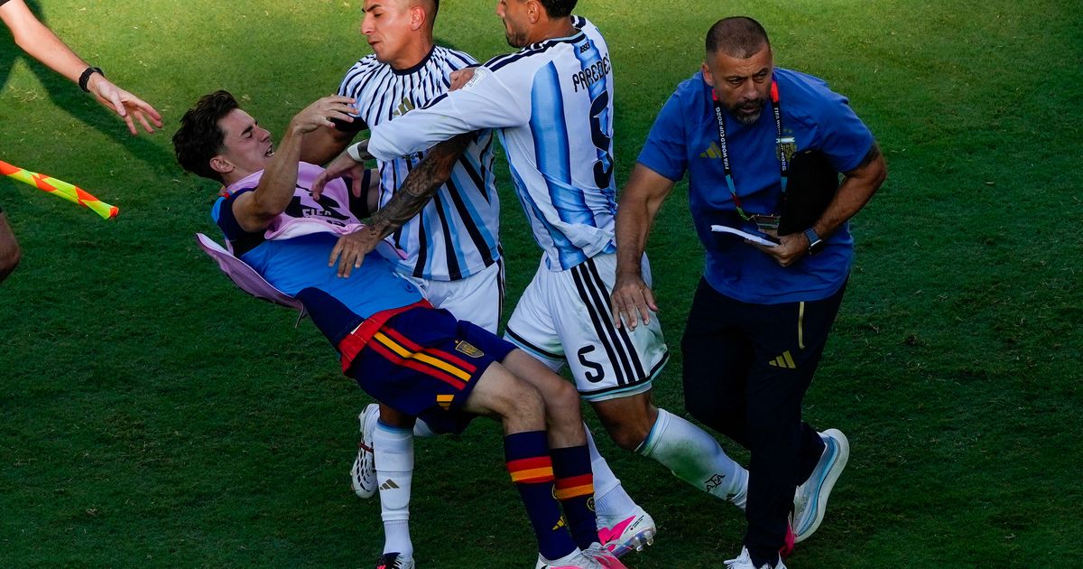 Spain’s on-field World Cup celebrations marred by scuffles with Argentina players