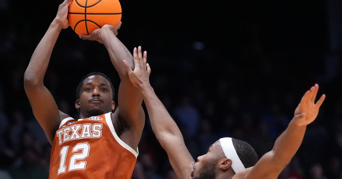 Tramon Mark's late jumper gives Texas a 68-66 win over NC State in the First Four