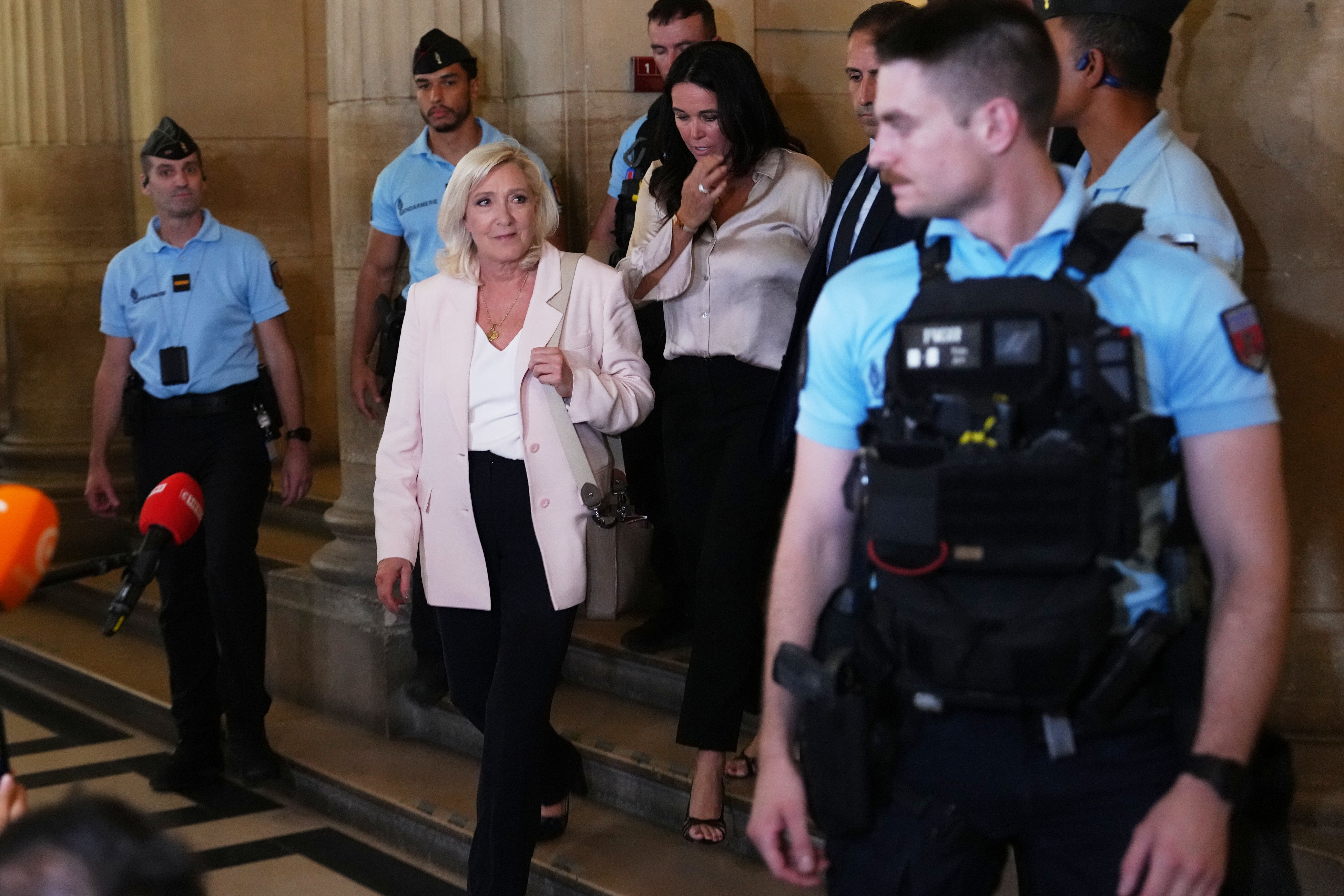 What to know about the electronic monitor a French court says Marine Le Pen must wear