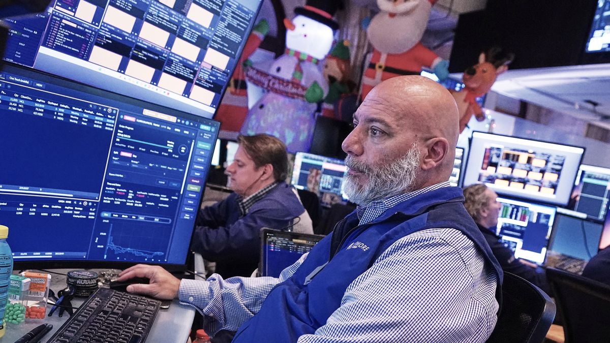 Trader Vincent Napolitano works on the floor of the New York Stock Exchange, Tuesday, Dec. 2, 2025. (AP Photo/Richard Drew)