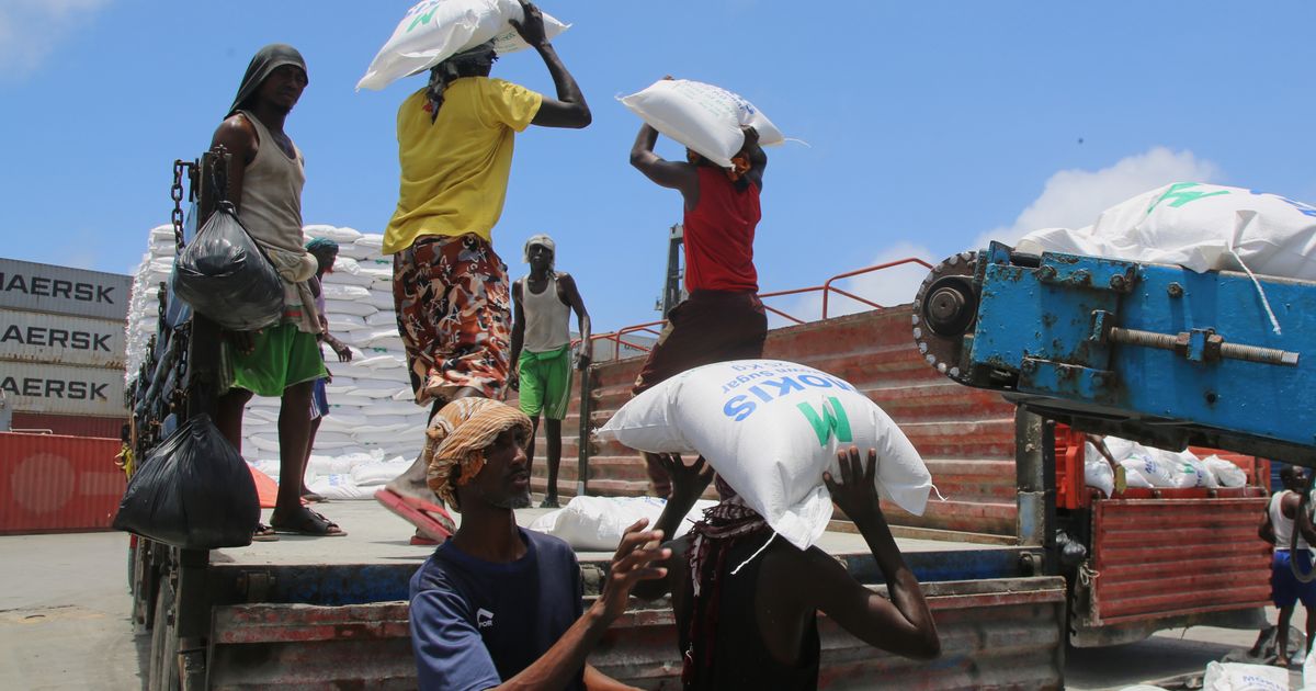 Workers load cargo at the port in Mogadishu, Somalia, Sunday, Sept. 13, 2026. (AP Photo/Farah Abdi Warsameh)