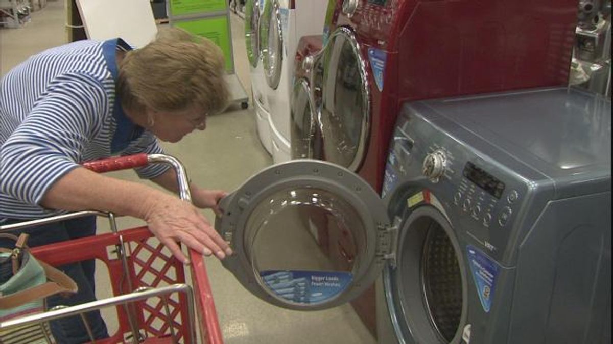 A federally funded rebate brought applicance shoppers to the stores Thursday.