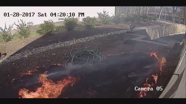 RAW: Fire caused by Low E windows burns sideyard of Davie County home