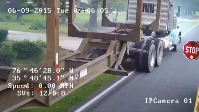 Raw: Log truck nearly hits girl crossing street