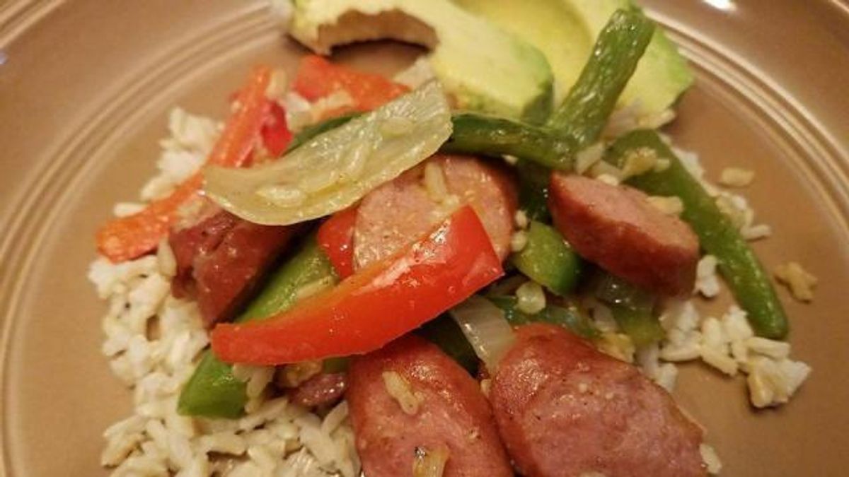 Turkey sausage, peppers and onion on brown rice