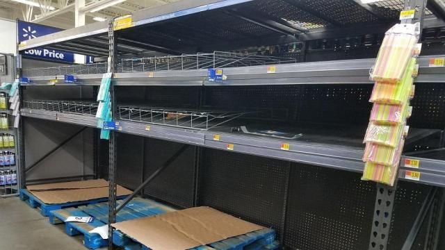 Empty bottled water shelves 9-9-18