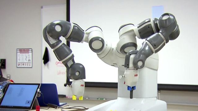 Wake Tech students, robots work side by side