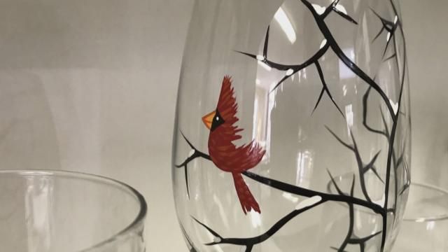 Cardinal on Wine Glass