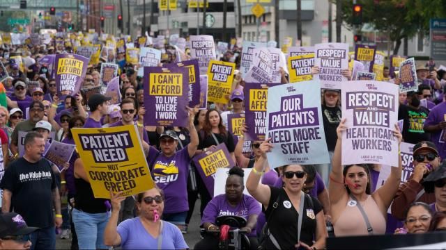 Frontline healthcare workers hold a demonstration on Labor Day outside Kaiser Permanente Los Angeles Medical Center in Hollywood in Los Angeles, September 4. Photo credit: Damian Dovarganes/AP