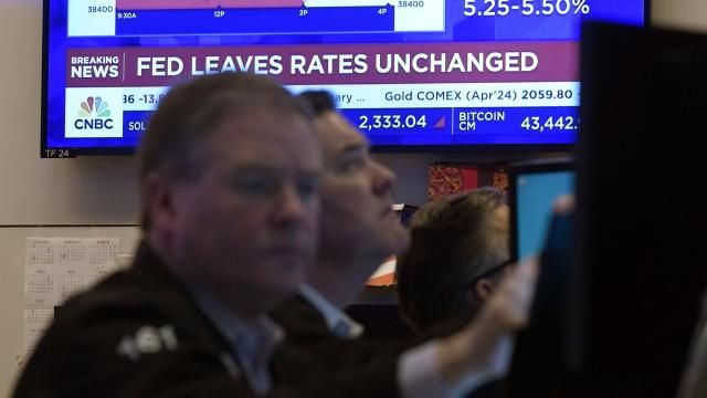 FILE - A television screen on the floor of the New York Stock Exchange displays the Federal Reserve's decision on interest rates, Jan. 31, 2024. From Wall Street investors to car dealers to potential home buyers, many Americans are eager for the Federal Reserve to start cutting its benchmark interest rate and reducing borrowing costs throughout the economy (AP Photo/Richard Drew, File) FILE - A television screen on the floor of the New York Stock Exchange displays the Federal Reserve's decision on interest rates, Jan. 31, 2024. From Wall Street investors to car dealers to potential home buyers, many Americans are eager for the Federal Reserve to start cutting its benchmark interest rate and reducing borrowing costs throughout the economy (AP Photo/Richard Drew, File)