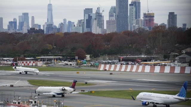 FILE - The New York City skyline is seen behind planes waiting to take off at LaGuardia Airport in New York, Nov. 22, 2023. Most Americans believe that air travel is generally safe in the U.S., despite some doubts about whether aircraft are being properly maintained and remain free from structural problems.(AP Photo/Seth Wenig, File) FILE - The New York City skyline is seen behind planes waiting to take off at LaGuardia Airport in New York, Nov. 22, 2023. Most Americans believe that air travel is generally safe in the U.S., despite some doubts about whether aircraft are being properly maintained and remain free from structural problems.(AP Photo/Seth Wenig, File)