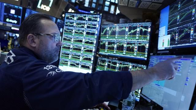 FILE - Specialist Anthony Matesic works at his post on the floor of the New York Stock Exchange, Wednesday, Jan. 31, 2024. (AP Photo/Richard Drew, File) FILE - Specialist Anthony Matesic works at his post on the floor of the New York Stock Exchange, Wednesday, Jan. 31, 2024. (AP Photo/Richard Drew, File)