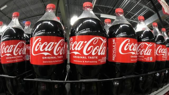 FILE - Bottles of Coca Cola are shown in a market in Pittsburgh on Jan. 26, 2023. Coca Cola reports results on Tuesday, Feb. 13, 2024. (AP Photo/Gene J. Puskar) FILE - Bottles of Coca Cola are shown in a market in Pittsburgh on Jan. 26, 2023. Coca Cola reports results on Tuesday, Feb. 13, 2024. (AP Photo/Gene J. Puskar)