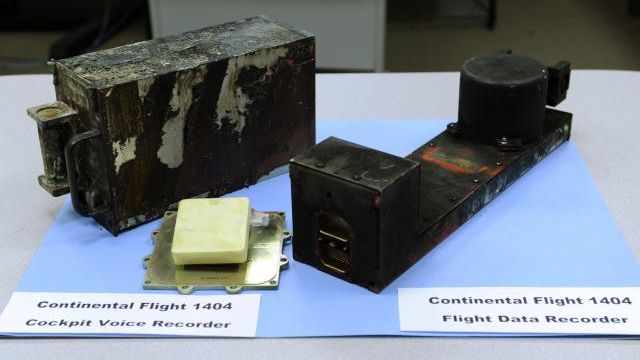 FILE - The cockpit voice recorder, left, and the flight data recorder from Continental flight 1404 airplane accident on display at the National Transportation Safety Board headquarters in Washington, Dec. 22, 2008. Federal accident investigators are pushing for better cockpit voice recorders. They are pointing to limits of the device on the jetliner that suffered a door-panel blowout last month over Oregon. The National Transportation Safety Board said Tuesday, Feb. 13, 2024 that the Federal Aviation Administration should require all current planes to have recorders that can capture 25 hours of audio, up from the current standard of two hours. (AP Photo, file) FILE - The cockpit voice recorder, left, and the flight data recorder from Continental flight 1404 airplane accident on display at the National Transportation Safety Board headquarters in Washington, Dec. 22, 2008. Federal accident investigators are pushing for better cockpit voice recorders. They are pointing to limits of the device on the jetliner that suffered a door-panel blowout last month over Oregon. The National Transportation Safety Board said Tuesday, Feb. 13, 2024 that the Federal Aviation Administration should require all current planes to have recorders that can capture 25 hours of audio, up from the current standard of two hours. (AP Photo, file)