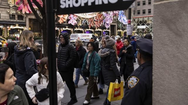 FILE - Shoppers and sightseers walk on Fifth Avenue on Dec. 11, 2023, in New York. In the United States, the economy motored ahead in last year's fourth quarter for a sixth straight quarter of growth since the pandemic's early days. (AP Photo/Yuki Iwamura, File) FILE - Shoppers and sightseers walk on Fifth Avenue on Dec. 11, 2023, in New York. In the United States, the economy motored ahead in last year's fourth quarter for a sixth straight quarter of growth since the pandemic's early days. (AP Photo/Yuki Iwamura, File)