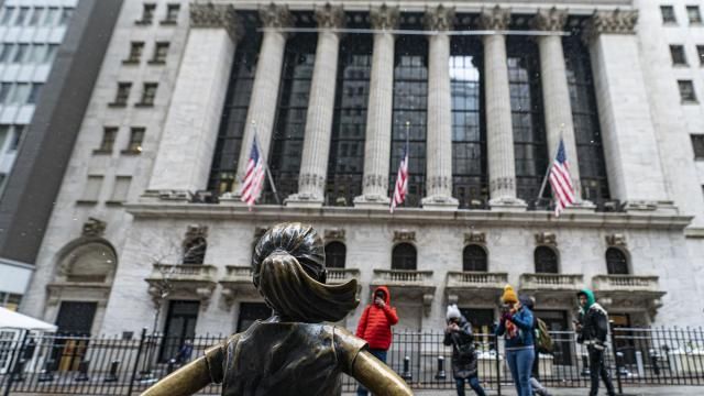 FILE - People photograph the Fearless Girl statue outside the New York Stock Exchange on Jan. 19, 2024, in New York. (AP Photo/Peter K. Afriyie, File) FILE - People photograph the Fearless Girl statue outside the New York Stock Exchange on Jan. 19, 2024, in New York. (AP Photo/Peter K. Afriyie, File)